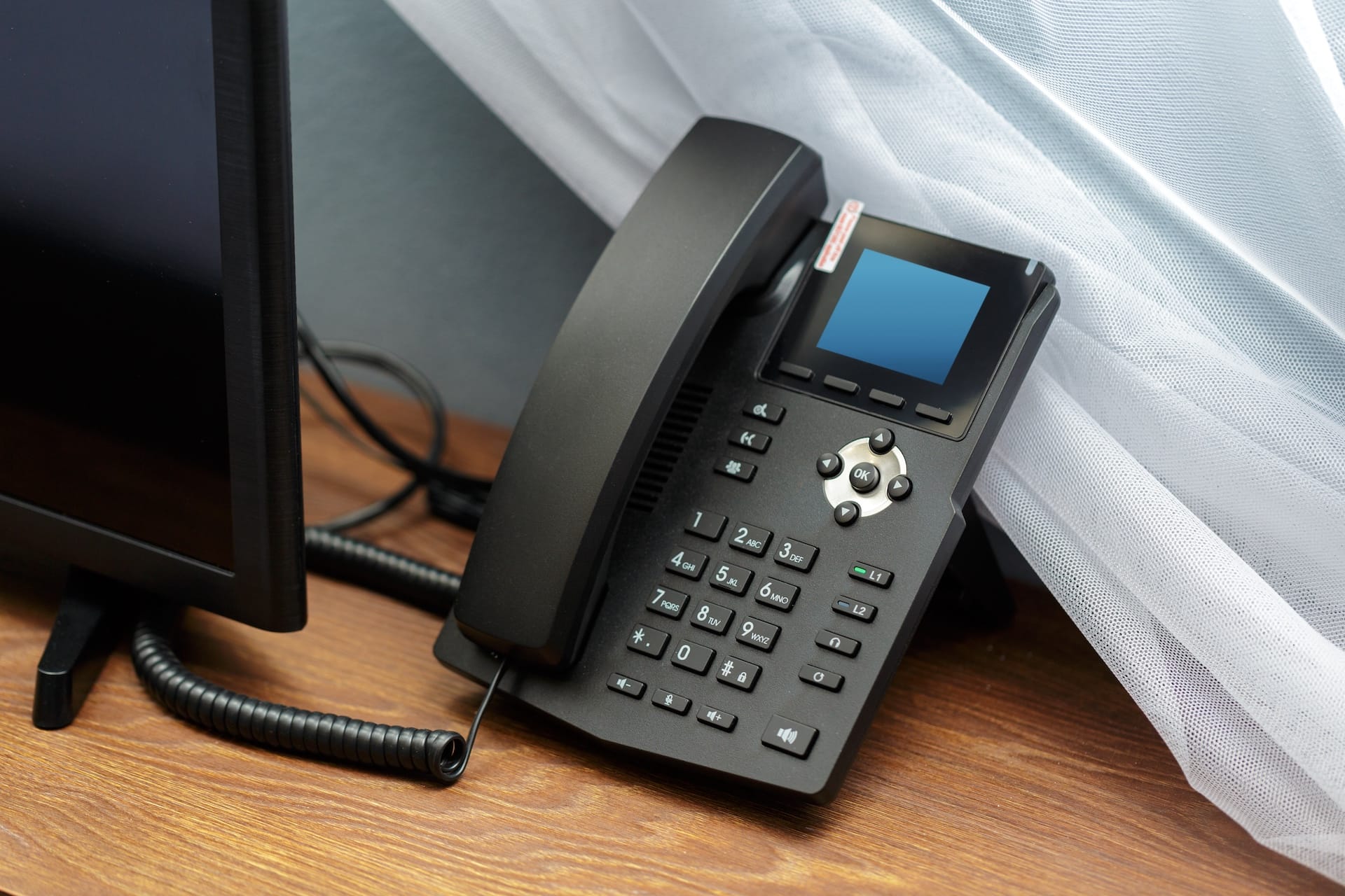 Desk phone representing voip phone systems and business voip communication solutions